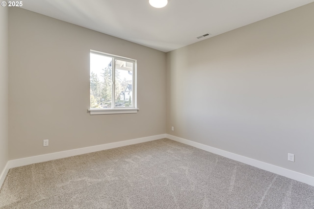 view of carpeted spare room