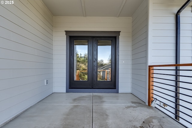 doorway to property featuring french doors