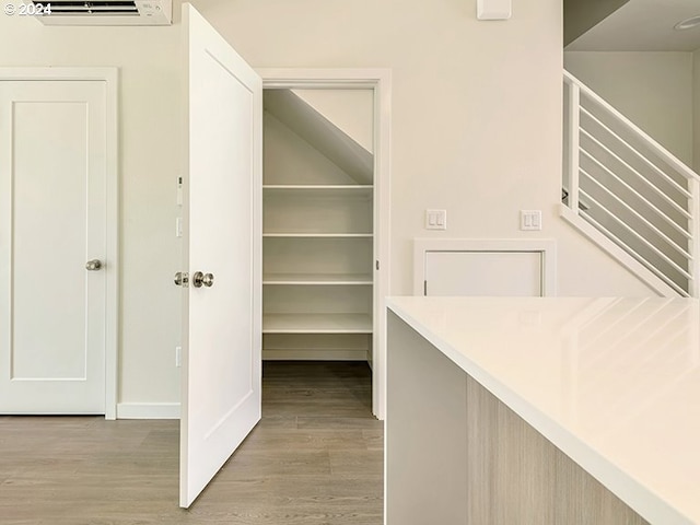 pantry featuring a wall unit AC