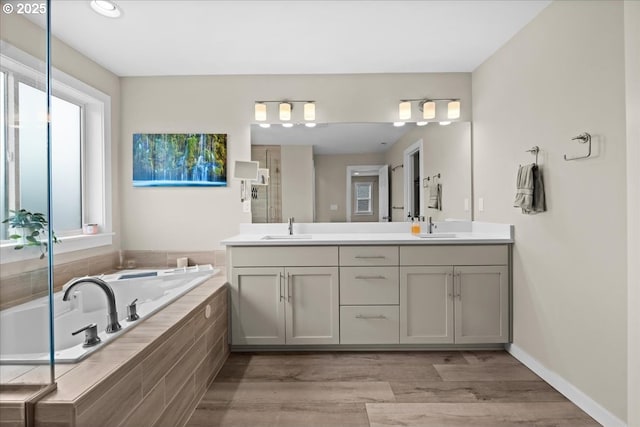 2410 S Heather St, Cornelius, OR 97113 - full bath with double vanity, a bath, and wood finished floors