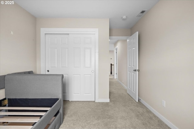 2410 S Heather St, Cornelius, OR 97113 - bedroom with light colored carpet, baseboards, and a closet