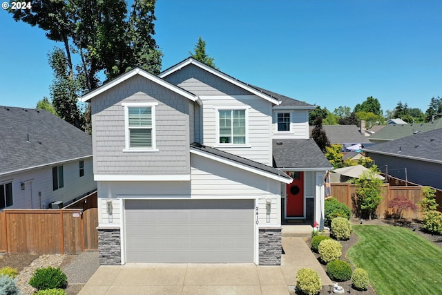 view of front of property with a garage