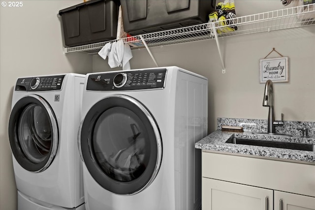 2410 S Heather St, Cornelius, OR 97113 - laundry area featuring separate washer and dryer and cabinet space