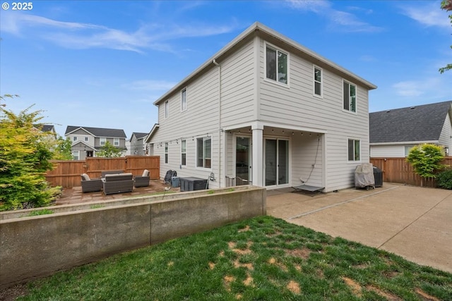 2410 S Heather St, Cornelius, OR 97113 - rear view of house featuring an outdoor living space, a patio, a fenced backyard, and central AC