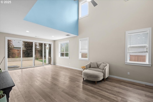 2410 S Heather St, Cornelius, OR 97113 - unfurnished room with ceiling fan, wood finished floors, baseboards, a towering ceiling, and recessed lighting