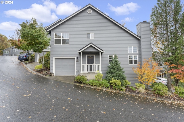 front of property with a garage