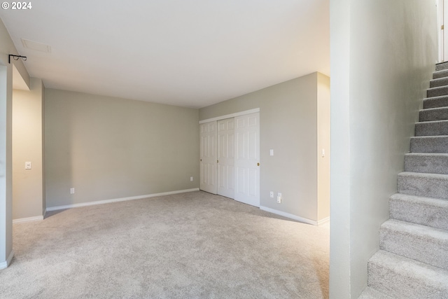 stairs with carpet flooring and baseboards