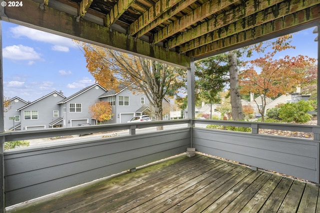 wooden deck with a residential view