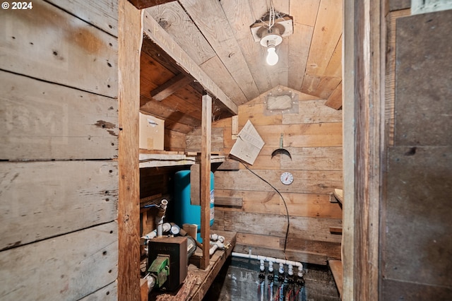 interior space featuring wooden walls and wood ceiling