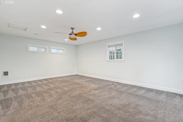 empty room featuring carpet and ceiling fan