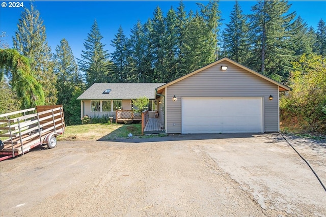 view of front of property with a wooden deck