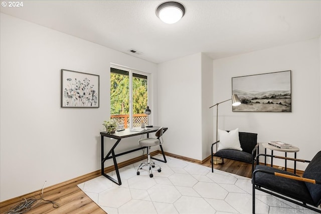 office area featuring light wood-type flooring