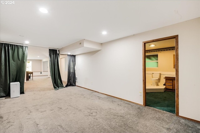 basement featuring carpet floors