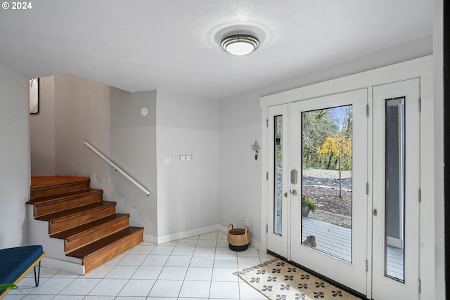 7184 Battle Creek Rd, Salem, OR 97317 - foyer featuring baseboards, stairway, and light tile patterned flooring
