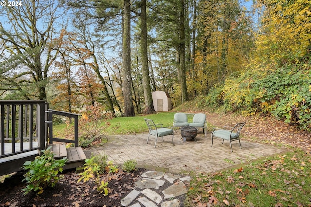 view of patio with a shed