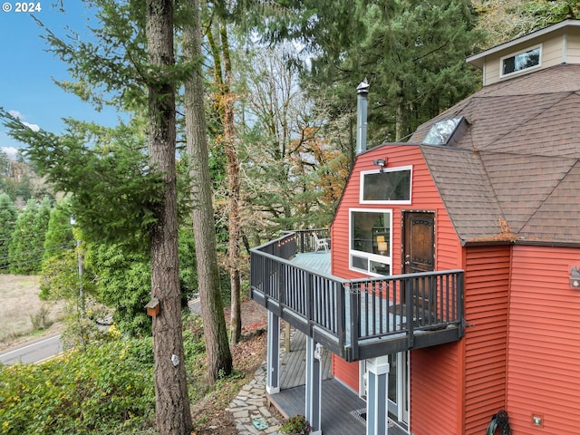 view of property exterior with a balcony