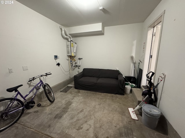 exercise room featuring water heater