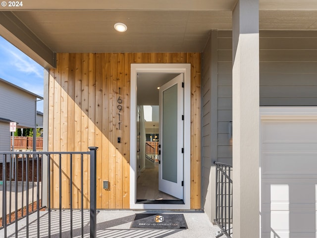 property entrance featuring fence
