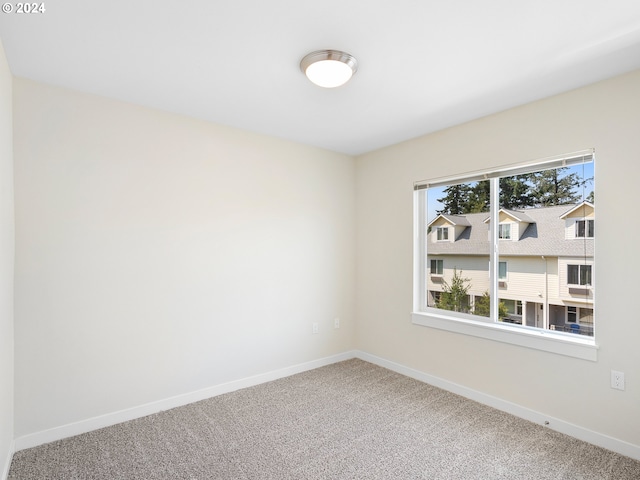 empty room featuring carpet