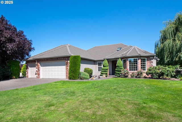 exterior space featuring a yard and a garage