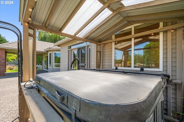 view of patio with a hot tub