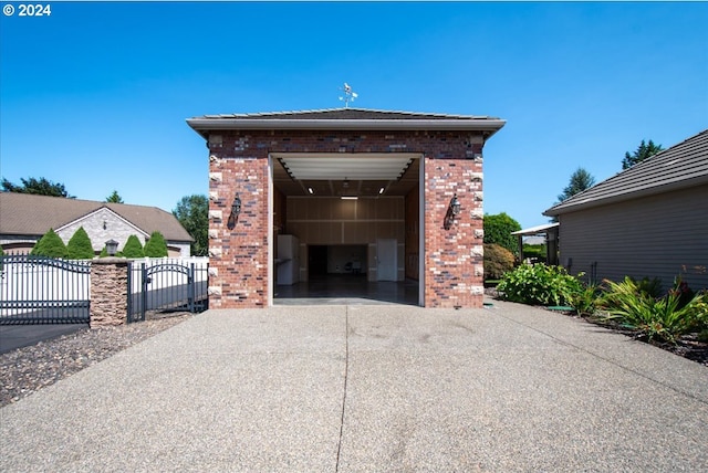 exterior space with an outdoor structure and a garage