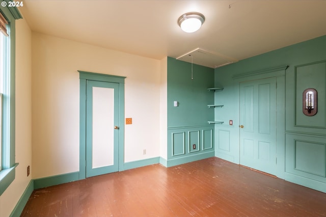 empty room with wood-type flooring