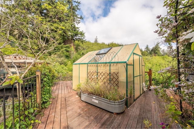 deck with an outbuilding