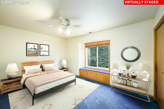 bedroom with carpet and ceiling fan