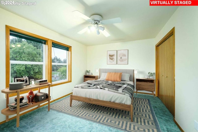 bedroom featuring dark carpet, baseboards, and ceiling fan