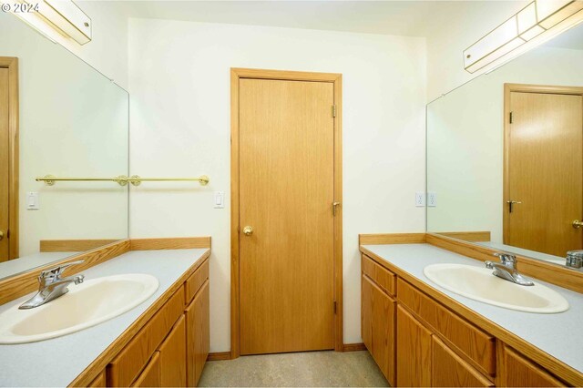 bathroom with vanity and a wall mounted air conditioner