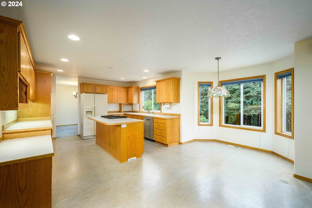 kitchen with a center island, pendant lighting, white refrigerator with ice dispenser, light countertops, and dishwasher