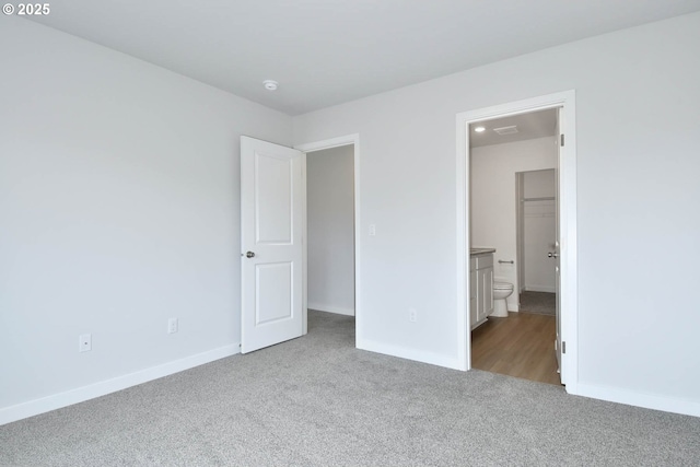 964 NE 14th St, Battle Ground, WA 98604 - unfurnished bedroom featuring carpet floors, baseboards, and ensuite bath