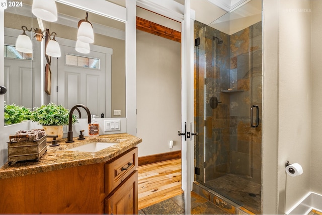 2945 SW Homesteader Rd, West Linn, OR 97068 - full bath featuring a shower stall, vanity, crown molding, and baseboards