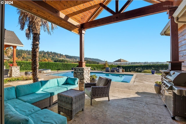 2945 SW Homesteader Rd, West Linn, OR 97068 - view of patio with an outdoor hangout area, a grill, and an outdoor pool
