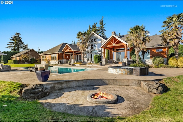 2945 SW Homesteader Rd, West Linn, OR 97068 - outdoor pool featuring a patio, a storage structure, a fire pit, and an outbuilding