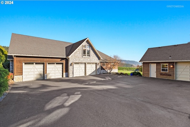 garage featuring a mountain view