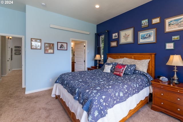 bedroom with light carpet