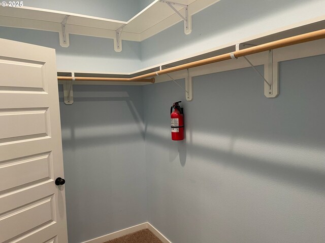 bathroom with vanity, an enclosed shower, and toilet