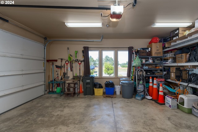 garage featuring a garage door opener