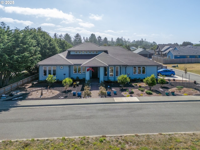 view of front of property with fence