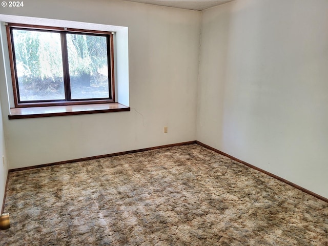 view of carpeted spare room