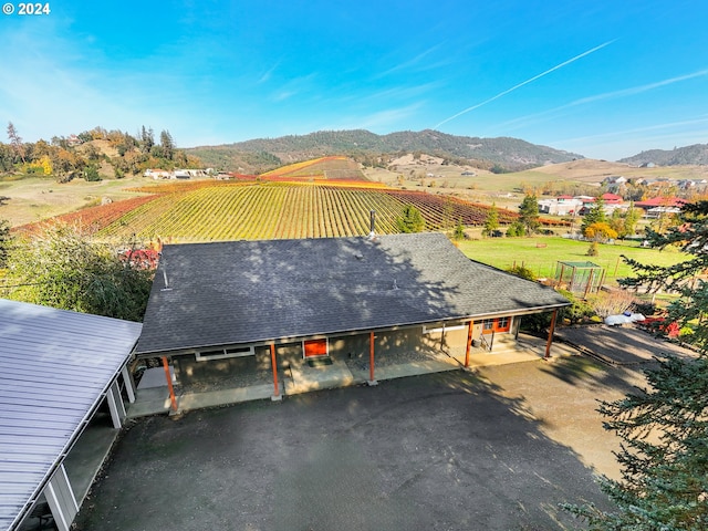 bird's eye view featuring a mountain view and a rural view