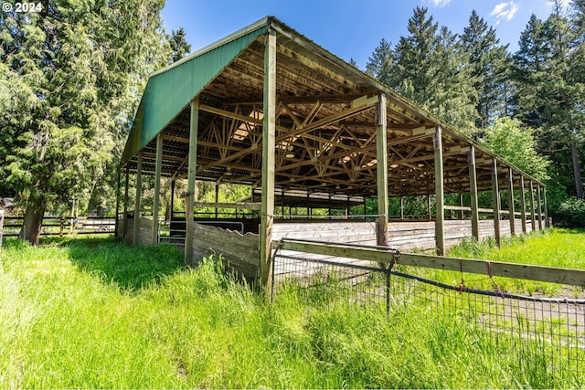 view of property's community with an outdoor structure