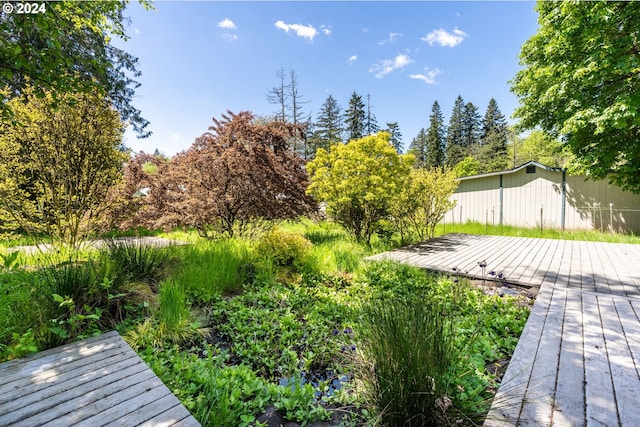 view of yard with a deck