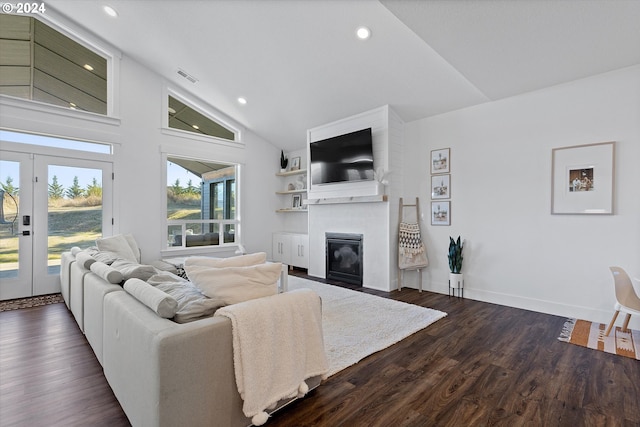 living room featuring a fireplace, french doors, high vaulted ceiling, and dark wood-type flooring