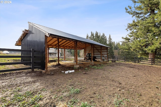 exterior space featuring an outbuilding