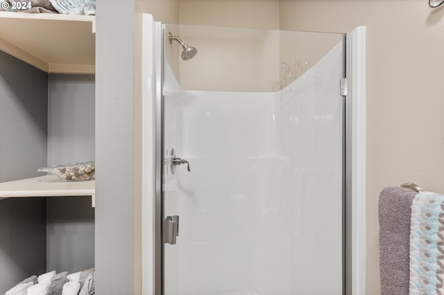 bathroom featuring an enclosed shower