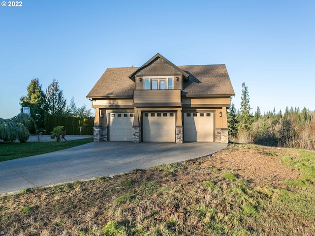 craftsman house featuring a garage