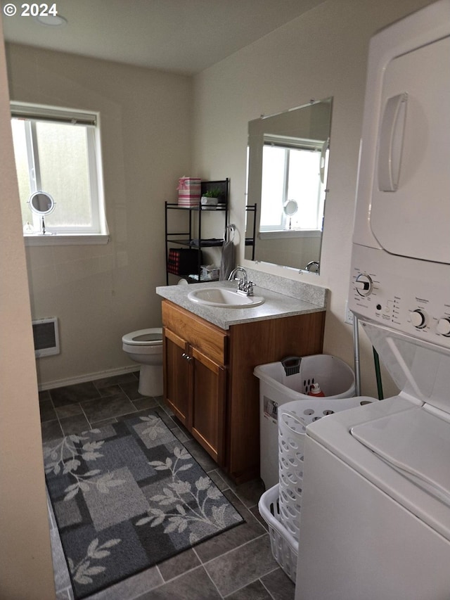 bathroom featuring tile patterned flooring, vanity, and toilet